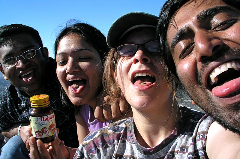 Krupesh, Rinku, Caroline, and Jay eating Hajmola while on a hike on a local Phoenix mountain
